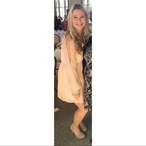 Peach long sleeve beaded around the wrist dress!